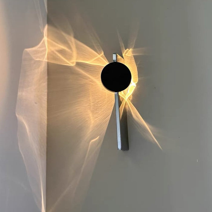 Ripple Rotating Ambient Wall Sconce