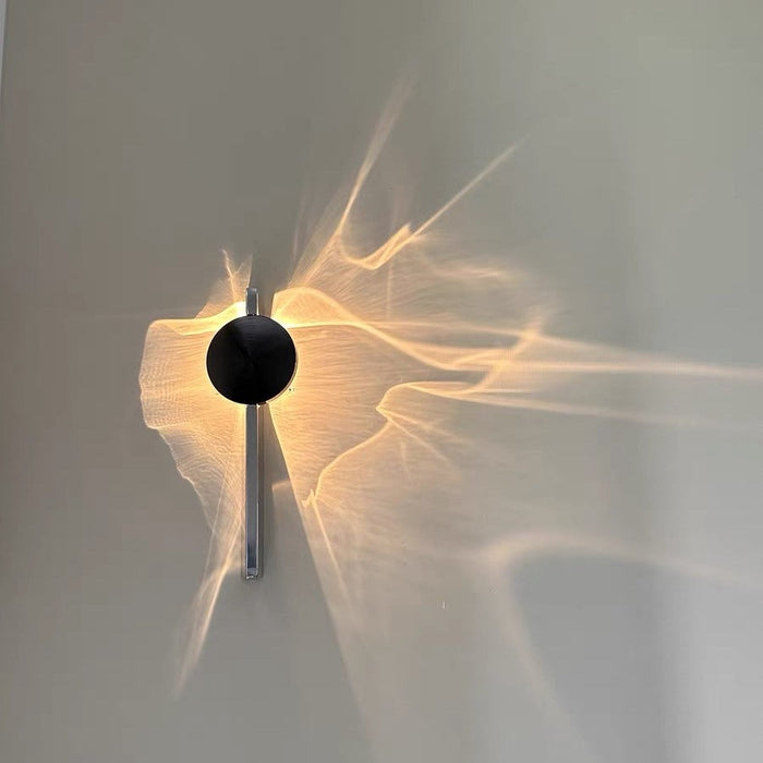 Ripple Rotating Ambient Wall Sconce